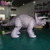 wholesale 4x1.7x2M Height Outdoor Giant Inflatable Animal Dinosaur Cartoon Triceratops Models For Event Advertising Zoo Decoration With Air Blower Toys Sports