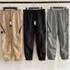 Mens Pant Cargo Pocket Lens Nylon Sweatpant Jogging Byxor utomhus vattentätt träning Löst man snabba torrbanor 231