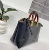 Sacs de soirée Sac de créateur de luxe femme Boston petit sac mini sac à main mot d'estampage à chaud poignet en verre avec longue bandoulière