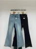 Damenhosen Nostalgische High-Waist-Jeans für Frauen im Vorfrühling mit strukturiertem Rand und schmaler Passform, die den Boden schlanker macht