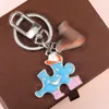 2024 Handmade Designer Keychains Multicolor Key Chain Women Men Brown Leather Bag Wallet Lanyard Plated Gold Accessories Dragonne Keychain Letter C9