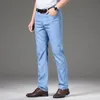 Klassisk stil Summer Men's Light Blue Thin Straight Jeans Business Casual Stretch Denim Pants Man Brand Loose Trousers 240125
