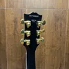 Sıcak satan siyah güzellik modeli lp elektro gitar Çin fabrikası doğrudan yüksek kaliteli ücretsiz gönderim