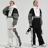 Vinterskiddräkt Kvinnor Outdoor Snowboarding Jacket Män förtjockad varm skidåkning Set vindsäker vattentät snöbyxor 240122