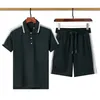 Designer Men's Sportswear Costume deux pièces noir et blanc à manches courtes Lettres classiques de luxe 100% coton Respirant Résistant aux rides Mode Short à manches courtes