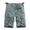 Mäns shorts arbetskläder för 2024 sommar tvättade fast färg Multi Pocket Casual Pants Cotton Five Point Sports