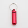 Porte-clés 100pcs de haute qualité mini bouteille étanche portable porte-clés créatif multi-usages bouteilles de stockage en métal porte-clés pendentif