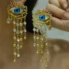 Xialuoke Devil Eye Earrings女性ヨーロッパアメリカンスタイルパーソナリティクリスタルタッセルダングルイヤリングパーティーハロウィーンジュエリー240122