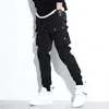 Moda Hip Hop Uomo Pantaloni cargo Streetwear Tuta da uomo Pantaloni da jogging Tendenza Pantaloni casual formali Uomo Punk Streetwear Pantaloni neri 240124