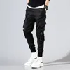 Moda Hip Hop Uomo Pantaloni cargo Streetwear Tuta da uomo Pantaloni da jogging Tendenza Pantaloni casual formali Uomo Punk Streetwear Pantaloni neri 240124