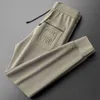 Spring and Autumn Leisure Guard Pants for Men s Slim Fit Versatile Trendy Embroidered Tie Feet Sports