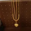 Collana di orecchini set temperamento alla moda con perline pendente a cuore collane a doppio strato per gioielli da regalo per ragazze da donna all'ingrosso