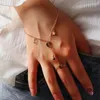 Charme Pulseiras YADA Anéis de Dedo Mão Harness Liga Cor de Ouro StarsMoon Bangles para Mulheres Cristal Jóias Pulseira Anel Uma Peça