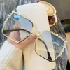 Projektant okulary przeciwsłoneczne Nowe okulary przeciwsłoneczne Pearl Metal Design Stylowa rama. Okulary przeciwsłoneczne z dekoracyjną dużą ramą i diamentową wkładką