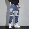 Klasyczne streetwearne spodni Mężczyźni Wstążki haremowe spodnie do joggingu męskie Slim Fit Spring Cargo Spodnie Multi-Pockets Women Spodni J7 240124