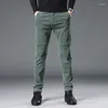 Męskie spodnie Spring Autumn Corduroy Mężczyźni rozciągnij gęste elastyczne talia puch puchowe koreańskie klasyczne brązowe spodnie męskie ubranie marki
