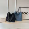 Borsa da donna di tendenza di strada Nuovo stile denim Griglia di diamanti Filo ricamato Piccola fragranza ascellare Borsa a tracolla con secchiello a catena alla moda vendite dirette in fabbrica