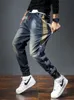 Mens Jeans Harem Pants Fashion Pockets Desinger Löst fit baggy Moto Jeans Män sträcker retro Streetwear Relaxed avsmalnande jeans 240131