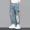 Klasyczne streetwearne spodni Mężczyźni Wstążki haremowe spodnie do joggingu męskie Slim Fit Spring Cargo Spodnie Multi-Pockets Women Spodni J7 240124