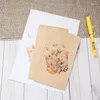 ギフトラップ20pcs/lot cartoon envelope kraft paper文房具用品結婚式の招待状のためのレトロな学生封筒カードポストカード