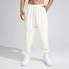 Pantaloni da uomo tinta unita elastico in vita coulisse allentata sport casual con tasche in memory foam antiscivolo da uomo