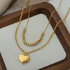 Collana di orecchini set temperamento alla moda con perline pendente a cuore collane a doppio strato per gioielli da regalo per ragazze da donna all'ingrosso