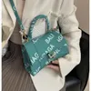 Модные дизайнерские сумки Маленькие мини-тоут с песочными часами Женские сумки для покупок Кошельки кошелек Роскошная искусственная кожа с буквой