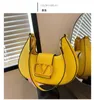 2024 Handväska Ladies Luxury Bags Designer Mini Bag Leisure Travel Ribbon Tote Bag Läder Material Fashion Shoulder Bag Wallet Axillary Pouch A2