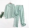 ホームウェアのための綿フランネルズボンパジャマスーツシンプルなプリントのゆるい秋と冬の長袖パンタパジャマの女性セット240202