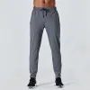 Gratis frakt Mens Joggers Spring and Summer Loose Ice Silk Outdoor Running Fitness Yoga Leisure Mens Pants Straight Track Pants