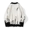 Black White Patchwork Pullovers Sweaters tvättade förstörda rippade tröjor män harajuku hål stickade hoppare för kvinnor överdimensionerade 240202