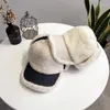 Berety bombowce czapki zima mężczyźni kobiety ciepłe rosyjskie futro Ushanka puszysty kapelusz z earflap baseball czapka jagnięcy pluszowe ochrona ucha Casquette