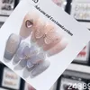 ピンクの手作りの偽のネイル韓国の贅沢なチャームボウズデザイン再利用可能な接着剤の爪フルカバー長いffinアクリルネイルチップ240129