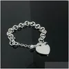 Pendentif Colliers 2023 T épais coeur flèche série Ti maison collier bracelet ensembles Europe et Amérique hommes femmes avec chaîne de clavicule Dhsy3