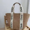 Praia tecido à mão pequeno nicho feminino cesta de vegetais férias bolsa feminina nova tendência moda vendas diretas da fábrica