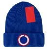 Beanie varumärkesdesigner beanie lyxig beanie hatt temperament mångsidig mössa varm brev mössa triangel design hatt present mode hatt flera färger mycket bra