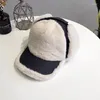 Berety bombowce czapki zima mężczyźni kobiety ciepłe rosyjskie futro Ushanka puszysty kapelusz z earflap baseball czapka jagnięcy pluszowe ochrona ucha Casquette