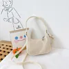 Stilista di moda per bambini Borsa per bambini Lettere Ragazze della gioventù Principessa Casual Borsa a tracolla classica Borse per caramelle Portamonete carino Mini Tote Borse a tracolla a tracolla