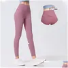 Yoga Outfit Lu-2023 Tessuto Lycra Tinta unita Pantaloni da donna Vita alta Sport Abbigliamento da palestra Leggings Elastico Fitness Lady Pantaloni da esterno Dro Otqg6