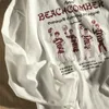 男性用の印刷された特大のTシャツハイストリート面白いグラフィックTシャツ日本スタイル長袖ユニセックスティーコットンY2Kトップ240122