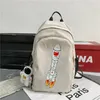 Sacs d'école Kawaii mignon dessin animé motif de fusée sac à dos unisexe et grande capacité étudiant Couple cartable pour envoyer pendentif de poupée