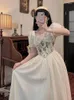 カジュアルドレスフランスのヴィンテージプリントフローラルメッシュドレス女性エレガントなイブニングパーティーミディ女性パフスリーブ韓国妖精夏2024年