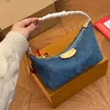 مصممة فاخرة للنساء تلال Pochette Blue Denim Canvas حقيبة القابض الصغيرة