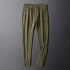 Pantalones de hombre de gama alta para otoño e invierno, pantalones casuales de felpa, polainas, pantalones deportivos, pantalones sanitarios bordados con letras elásticas para mujer