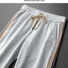 Pantalon de sport décontracté de luxe léger pour hommes, tendance printemps et automne, polyvalent, ruban contrasté brodé, coupe ajustée, jambe droite