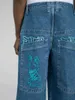 Jeans da donna personalità di tendenza americana Harajuku pantaloni hip-hop dritti a gamba larga Y2K nuovi pantaloni casual larghi da clown pantaloni punk moda mop J240217