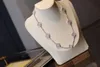 2024 Designers halsband för kvinnor lyx 18k med 10 blommor fyra bladklöver hänge halsband toppkvalitet guld klassisk kedjeskal för bröllop smycken med boxq1