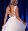Plus-storlek Vita bröllopsklänningar elfenben brudklänningar formella en linje ärmlös tyllan anpassad blixtlås snör upp ny o-hals applikation rygglös
