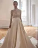 Milla Nova Une Ligne Robes De Mariée pour la mariée Col Haut Perles Robe De Mariée Manches Longues Couvertes Perles Dos Robes De Mariée Designer Balayage Train