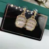 Boucles d'oreilles dorées pendantes avec timbre Vintage Chic lettre plaqué boucles d'oreilles clous avec boîte cadeau